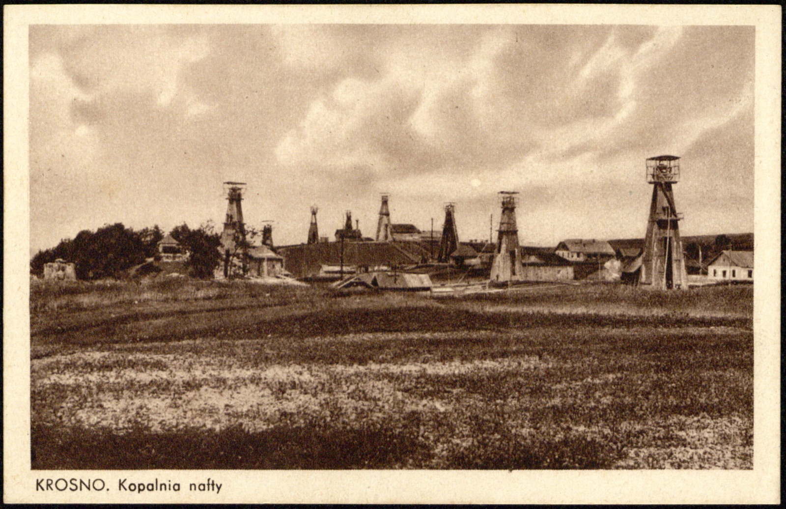 Kopalnia nafty (panorama pól z wieżami wiertniczymi); nakł. M. Monheit, Krosno; rewers podzielony; nieobiegowa